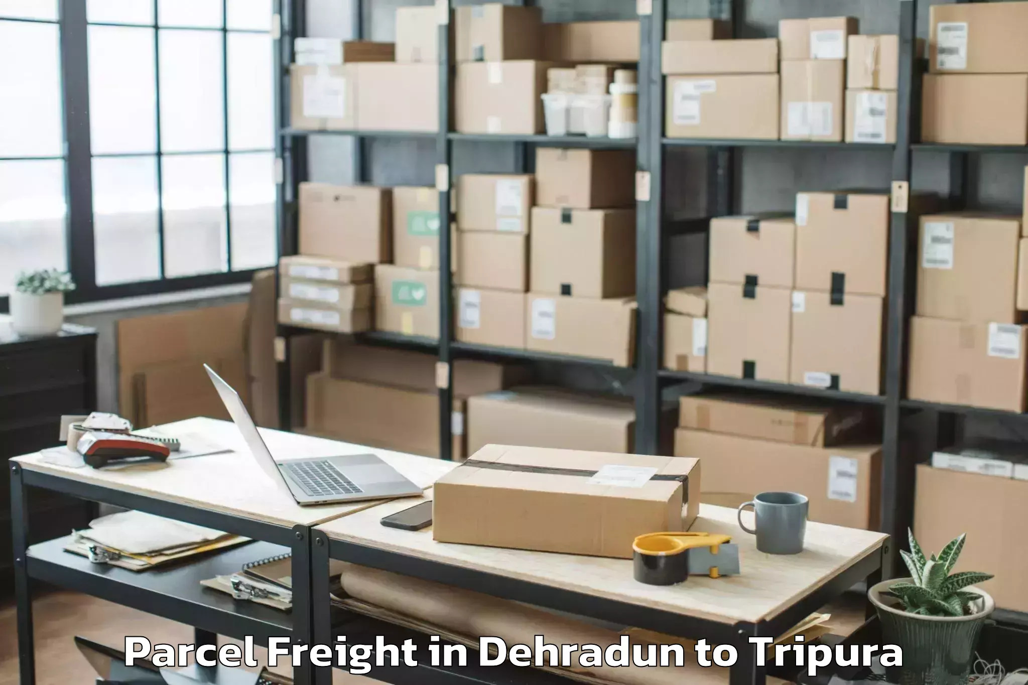 Book Dehradun to Kumarghat Parcel Freight Online